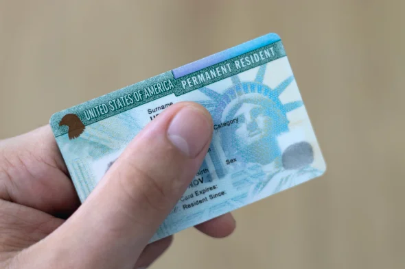 A person holding a US green card 